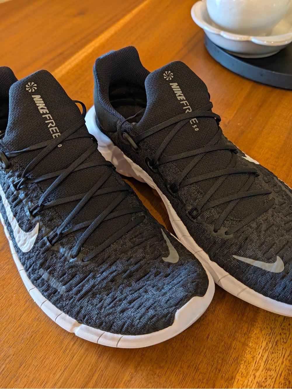Nike Men’s Black and White Flyknit Athletic Running Shoes